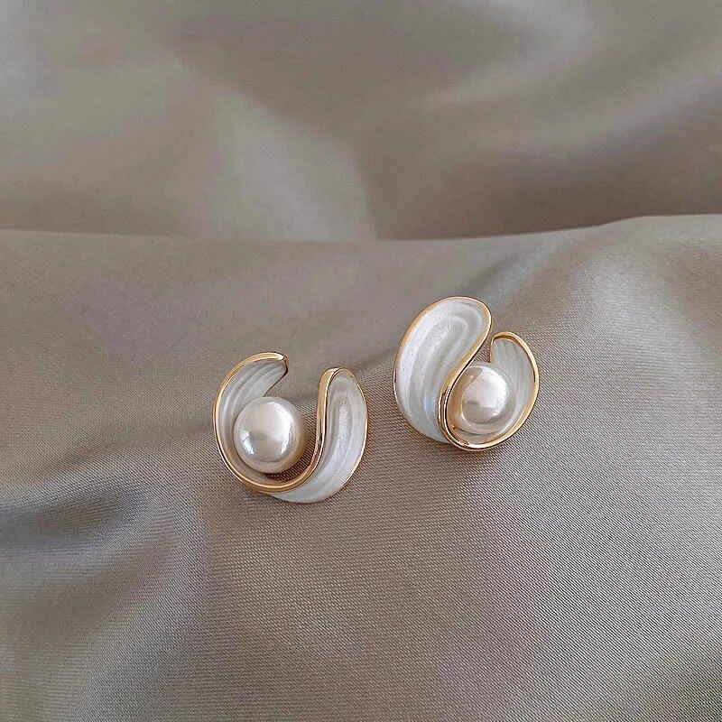 Luxurious Gold Earrings Featuring White Opals and Pearls